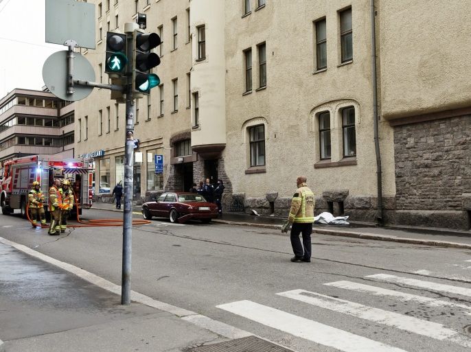 Police and rescue personnel are seen at the scene of an accident in downtown Helsinki where an intoxicated man hit people with his car, in Helsinki, Finland July 28, 2017. NOTE: register plate has been blurred. Roni Rekomaa/Lehtikuva/via REUTERS ATTENTION EDITORS - THIS IMAGE WAS PROVIDED BY A THIRD PARTY. NO THIRD PARTY SALES. FINLAND OUT.