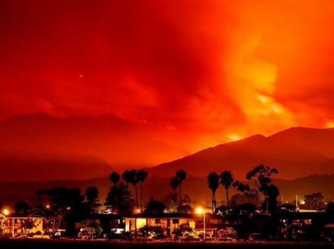 Smoke is illuminated by the Whittier wildfire near Santa Ynez, California, U.S. July 8, 2017. Picture taken July 8, 2017. Calfire/Handout via REUTERS. ATTENTION EDITORS - THIS IMAGES WAS PROVIDED BY A THIRD PARTY.
