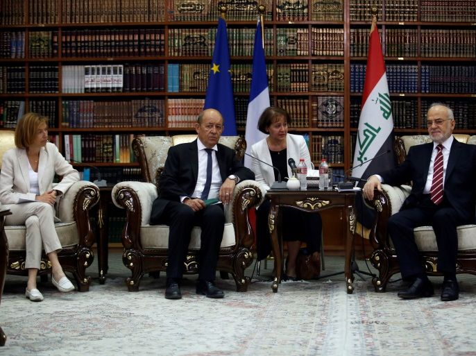 French Foreign Minister Jean-Yves Le Drian (C) and French Defence Minister Florence Parly (L) meet with Iraqi Foreign Minister Ibrahim al-Jaafari in Baghdad, Iraq August 26, 2017. REUTERS/Khalid al Mousily