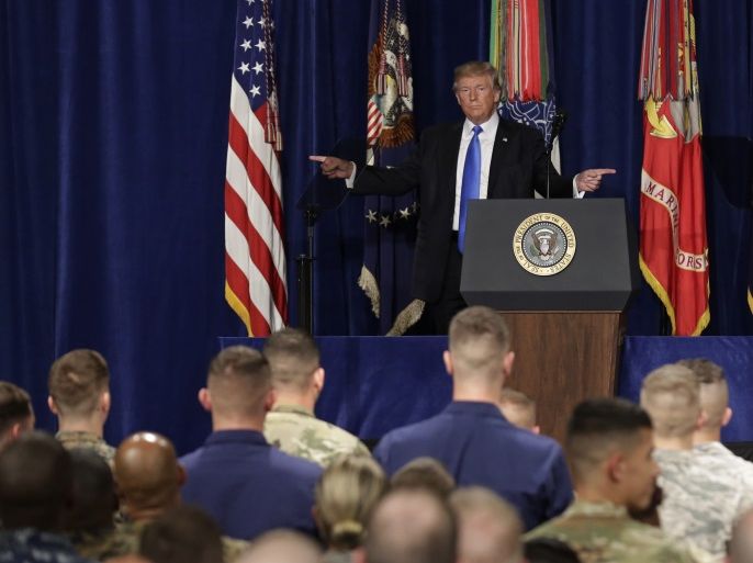 U.S. President Donald Trump gestures as he departs after announcing his strategy for the war in Afghanistan during an address to the nation from Fort Myer, Virginia, U.S., August 21, 2017. REUTERS/Joshua Roberts