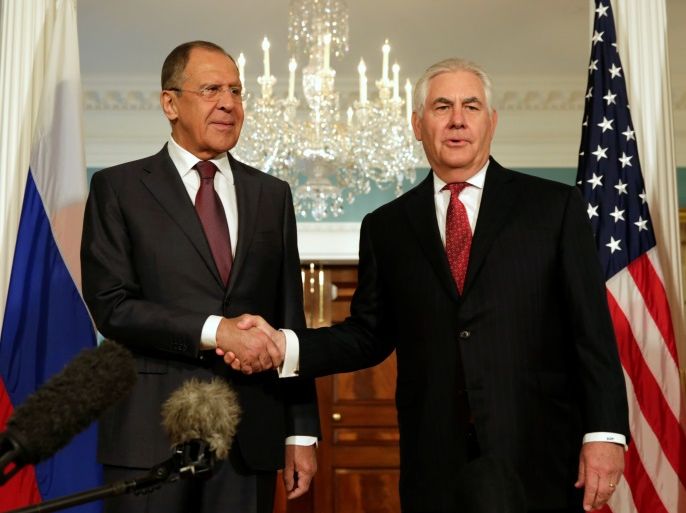 U.S. Secretary of State Rex Tillerson (R) shakes hands with Russian Foreign Minister Sergey Lavrov before their meeting at the State Department in Washington, U.S., May 10, 2017. REUTERS/Yuri Gripas