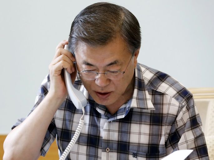 South Korean President Moon Jae-in talks to US President Donald J. Trump over the phone