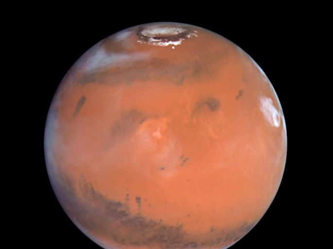 This 1999 Hubble telescope image shows Mars when Mars was 54 million miles (87 million kilometers) from Earth. A NASA spacecraft designed to investigate how Mars lost its water is expected to put itself into orbit around the Red Planet on Sunday after a 10-month journey. After traveling 442 million miles (711 million km) from Earth, the Mars Atmosphere and Volatile Evolution, or MAVEN, probe faces a do-or-die burn of its six braking rockets beginning at 9:37 p.m. EDT/0137 GMT. REUTERS/NASA/Handout (OUTER SPACE - Tags: ENVIRONMENT SCIENCE TECHNOLOGY) FOR EDITORIAL USE ONLY. NOT FOR SALE FOR MARKETING OR ADVERTISING CAMPAIGNS. THIS IMAGE HAS BEEN SUPPLIED BY A THIRD PARTY. IT IS DISTRIBUTED, EXACTLY AS RECEIVED BY REUTERS, AS A SERVICE TO CLIENTS