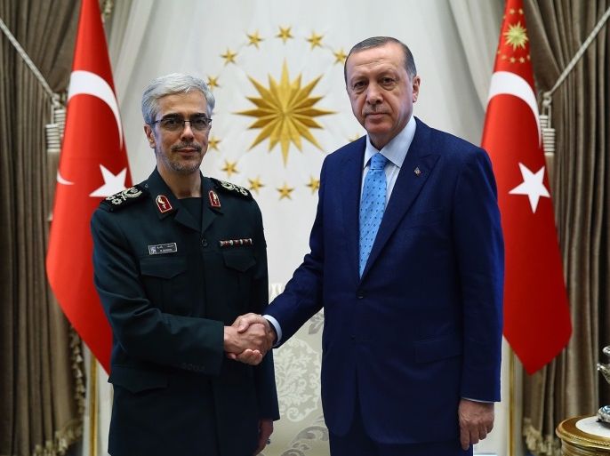 ANKARA, TURKEY - AUGUST 16: President of Turkey Recep Tayyip Erdogan (R) shakes hands with General Staff of the Armed Forces of Iran, Mohammad Bagheri (L) ahead of their meeting at Presidential Complex in Ankara, Turkey on August 16, 2017.