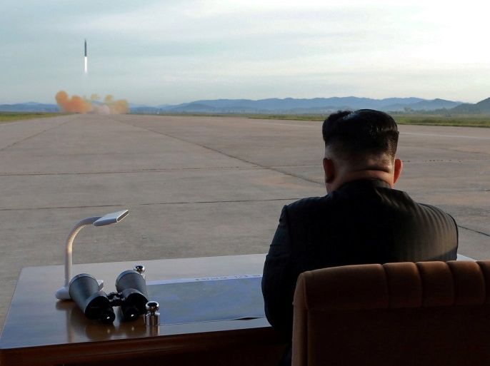 North Korean leader Kim Jong Un watches the launch of a Hwasong-12 missile in this undated photo released by North Korea's Korean Central News Agency (KCNA) on September 16, 2017. KCNA via REUTERS ATTENTION EDITORS - THIS PICTURE WAS PROVIDED BY A THIRD PARTY. REUTERS IS UNABLE TO INDEPENDENTLY VERIFY THE AUTHENTICITY, CONTENT, LOCATION OR DATE OF THIS IMAGE. NO THIRD PARTY SALES. SOUTH KOREA OUT. TPX IMAGES OF THE DAY