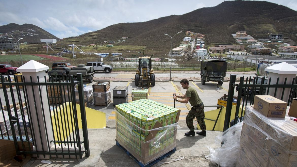This handout photograph provided courtesy of the Dutch Department of Defense on September 8, 2017 shows Royal Navy personnel preparing supplies for victims of Hurricane Irma on the Dutch Caribbean island of Sint Maarten.Hurricane Irma killed two people and wounded 43 others when it barrelled through the Dutch part of the Caribbean island of Saint Martin, a Dutch official said September 8. / AFP PHOTO / DUTCH DEFENSE MINISTRY / GERBEN VAN ES / Netherlands OUT / RESTRICTED TO EDITORIAL USE - MANDATORY CREDIT 'AFP PHOTO / DUTCH DEFENSE MINISTRY/GERBEN VAN ES' - NO MARKETING NO ADVERTISING CAMPAIGNS - DISTRIBUTED AS A SERVICE TO CLIENTS        (Photo credit should read GERBEN VAN ES/AFP/Getty Images)