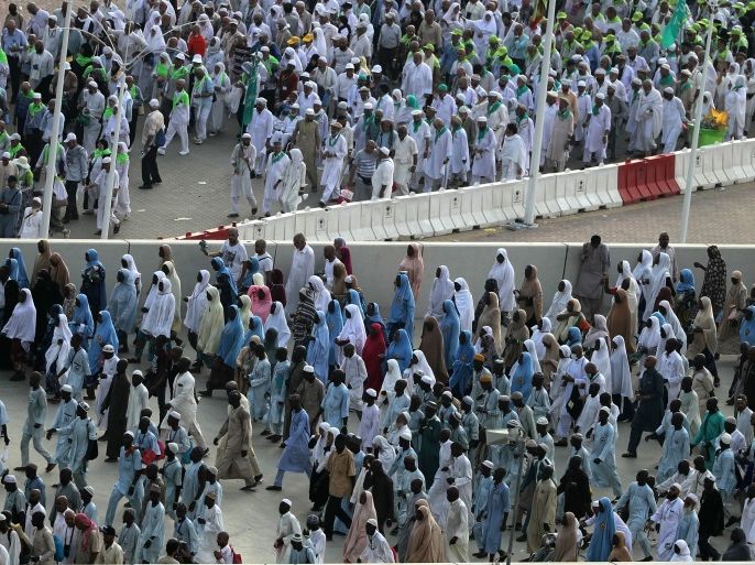 Muslim pilgrims head to take part in the symbolic stoning of the devil at the Jamarat Bridge in Mina, near Mecca, which marks the final major rite of the hajj on September 2, 2017. Saudi Arabia says it has deployed more than 100,000 security personnel to keep pilgrims safe this year. / AFP PHOTO / KARIM SAHIB (Photo credit should read KARIM SAHIB/AFP/Getty Images)