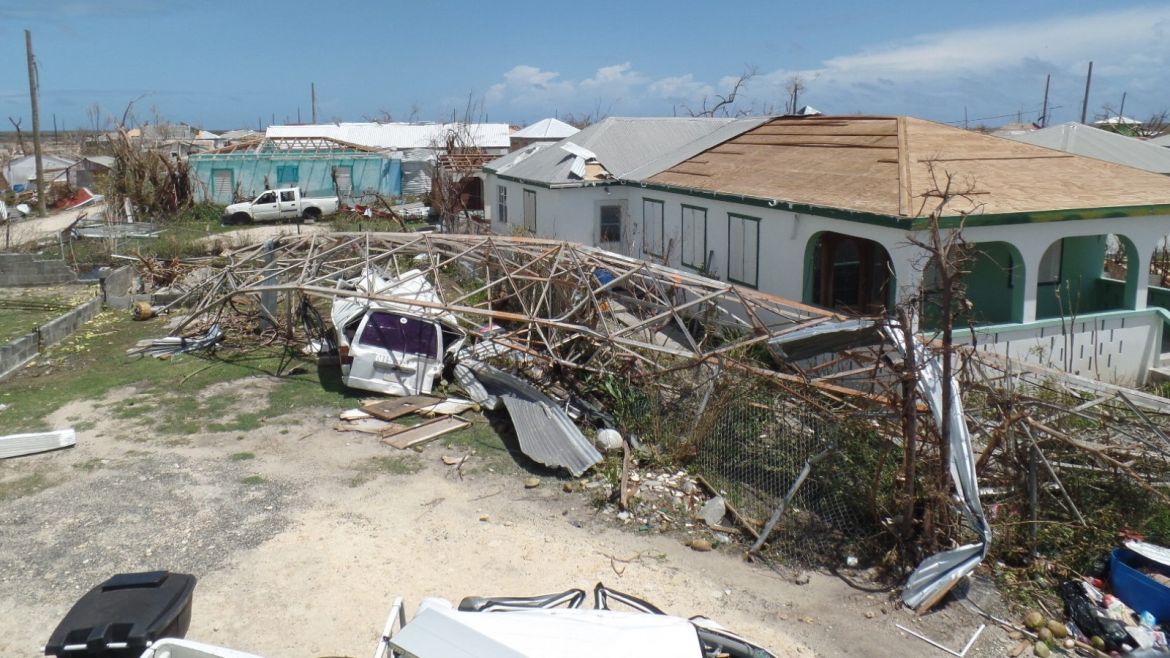 Houses are seen on September 8, 2017 in Codrington, Antigua and Barbuda, devastated by Hurricane Irma. Hurricane Irma on Thursday slashed its way through the Caribbean towards the United States, transforming tropical island paradises into scenes of death and ruin. / AFP PHOTO / Gemma HANDY        (Photo credit should read GEMMA HANDY/AFP/Getty Images)