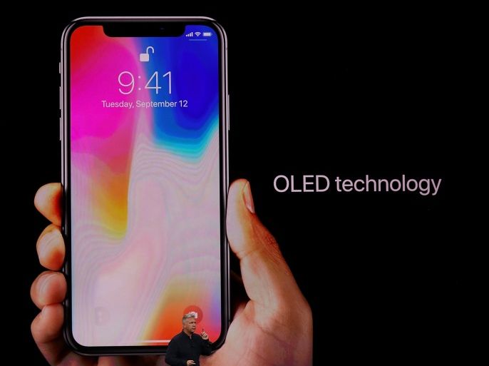CUPERTINO, CA - SEPTEMBER 12: Apple Senior Vice President of Worldwide Marketing Phil Schiller introduces the new iPhone X during an Apple special event at the Steve Jobs Theatre on the Apple Park campus on September 12, 2017 in Cupertino, California. Apple is holding their first special event at the new Apple Park campus where they are expected to unveil a new iPhone. (Photo by Justin Sullivan/Getty Images)