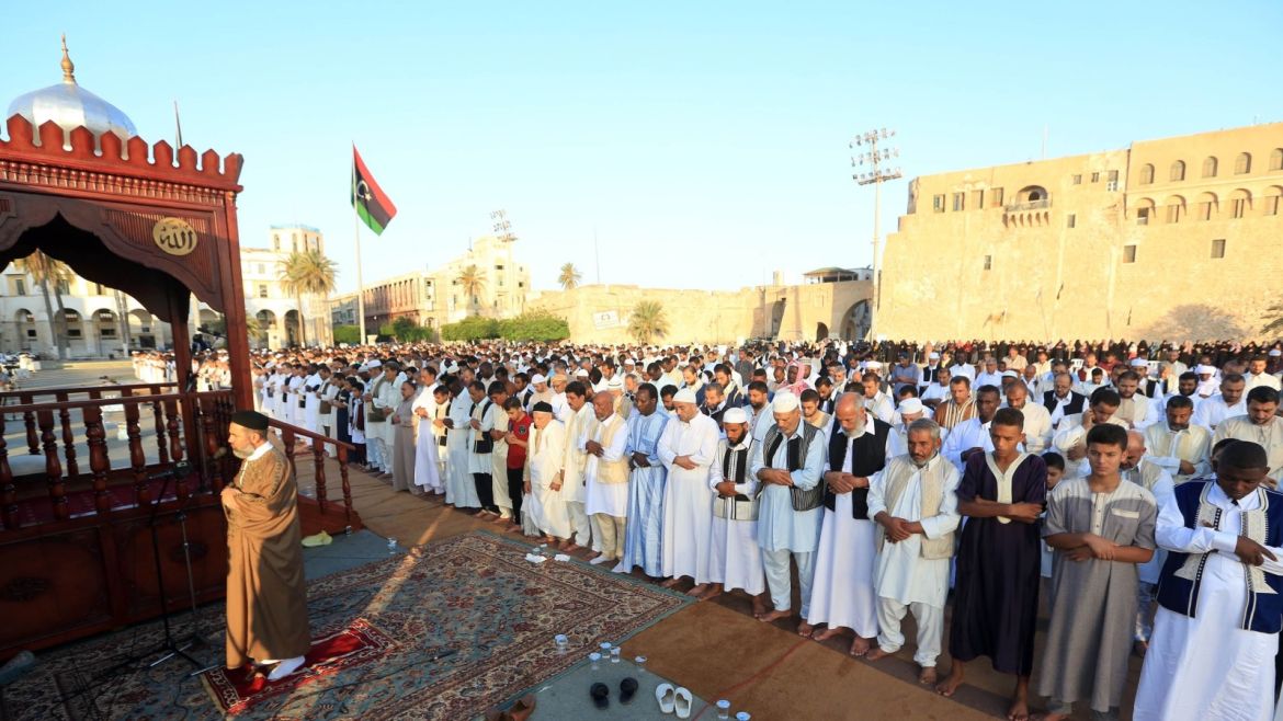 Libyan Muslims pray in Martyrs' Square in the capital Tripoli on September 1, 2017 as Muslims across the world celebrate the annual festival of Eid al-Adha, or the festival of sacrifice, which marks the end of the Hajj pilgrimage to Mecca and commemorates prophet Abraham's readiness to sacrifice his son to show obedience to God. / AFP PHOTO / MAHMUD TURKIA        (Photo credit should read MAHMUD TURKIA/AFP/Getty Images)