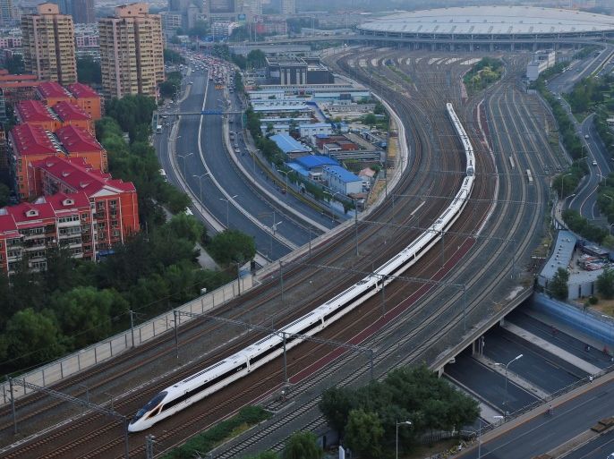 A Fuxing bullet train departs from Beijing South Railway Station to Shanghai, as the country restores the world's fastest bullet train, running at 350 kilometres per hour, six years after it reduced the speed of its trains, in Beijing, China September 21, 2017. China Daily via REUTERS ATTENTION EDITORS - THIS IMAGE WAS PROVIDED BY A THIRD PARTY. CHINA OUT. NO COMMERCIAL OR EDITORIAL SALES IN CHINA.