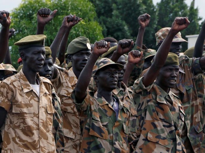 South Sudanese soldiers cheer during a ceremony marking the thirty fourth anniversary of the Sudan People's Liberation Army (SPLA) at the military headquarters in Juba, South Sudan May 18, 2017. REUTERS/Jok Solomun