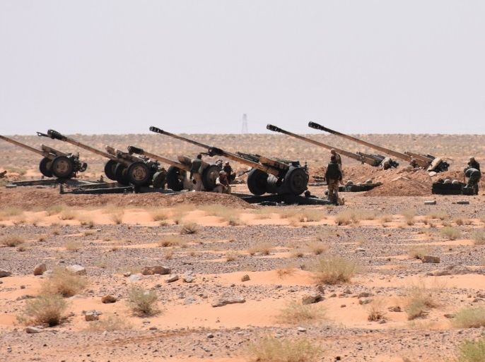 A picture taken on September 3, 2017 shows Syrian army artillery guns stationed near the village of Huraybishah, within the administrative borders of Syria's eastern Deir Ezzor province. / AFP PHOTO / George OURFALIAN (Photo credit should read GEORGE OURFALIAN/AFP/Getty Images)