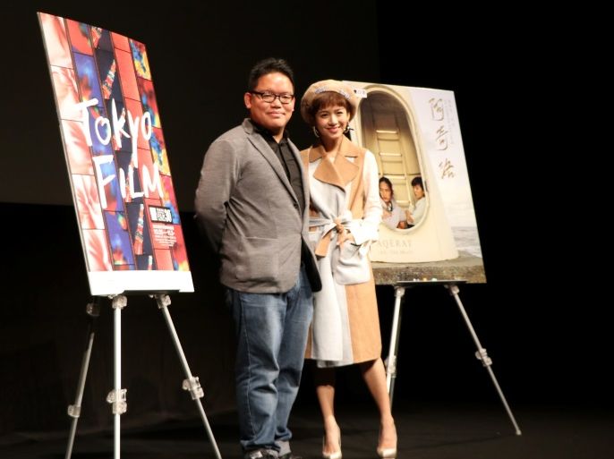 Malaysian filmmaker Edmund Yeo (L) and actress Daphne Low attend a post-screening Q&A session about their movie
