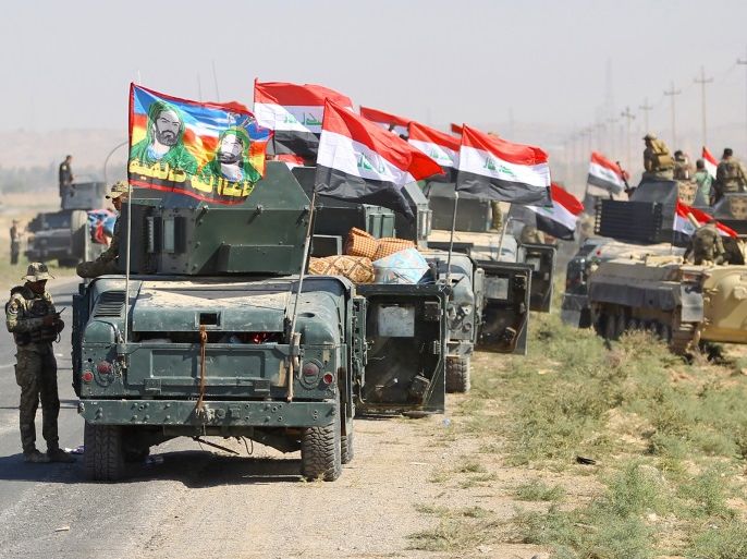 Iraqi forces advance towards the city of Kirkuk during an operation against Kurdish fighters on October 16, 2017. Iraqi forces clashed with Kurdish fighters near the disputed city of Kirkuk, seizing a key military base and other territory in a major operation sparked by a controversial independence referendum. / AFP PHOTO / AHMAD AL-RUBAYE (Photo credit should read AHMAD AL-RUBAYE/AFP/Getty Images)