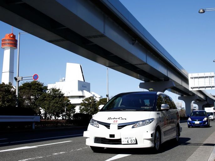 ZMP's RoboCar makes its way during its autonomous driving demonstration in Tokyo, Japan, January 31, 2017. Picture taken on January 31, 2017. REUTERS/Kim Kyung-Hoon