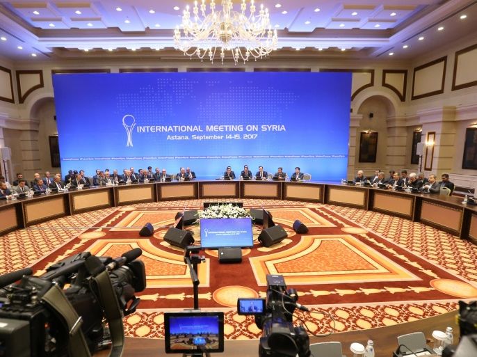 Representatives of the Syria regime and rebel groups along with other attendees take part in the session of Syria peace talks in Astana on September 15, 2017.Russia, Iran and Turkey have in Astana reached a deal to jointly police a fourth safe zone as part of a Russia-driven plan to still fighting in the six-year Syrian conflict. According to a joint declaration produced at the end of two days of talks in Kazakh capital, the trio agreed to deploy 'de-escalation control