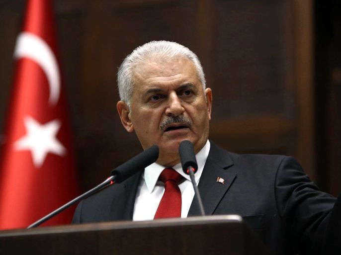 Turkish Prime Minister Binali Yildirim gestures as he speaks during the AK Party's group meeting at the Grand National Assembly of Turkey (TBMM) in Ankara, on October 17, 2017. / AFP PHOTO / ADEM ALTAN (Photo credit should read ADEM ALTAN/AFP/Getty Images)