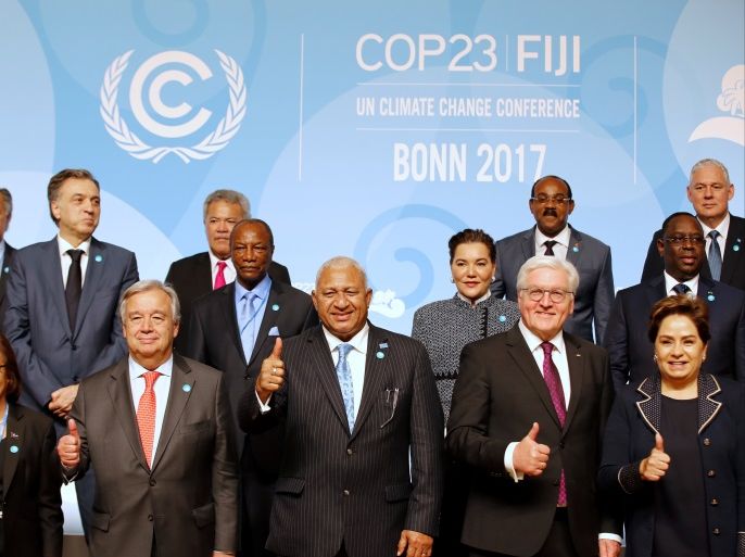 German President Frank-Walter Steinmeier, COP23 President Prime Minister Frank Bainimarama of Fiji, U.N. Secretary-General Antonio Guterres, Patricia Espinosa, Executive Secretary of the United Nations Framework Convention on Climate Change, pose for a family photo during COP23 U.N. Climate Change Conference in Bonn, Germany, November 15, 2017. REUTERS/Wolfgang Rattay