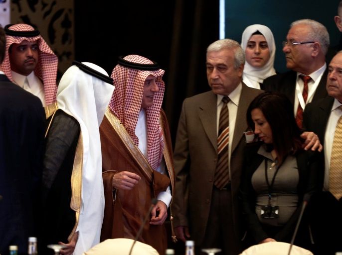 Saudi Foreign Minister Adel al-Jubeir (C) reacts at a Syrian opposition meeting in Riyadh, Saudi Arabia, November 22, 2017. REUTERS/Faisal Al Nasser