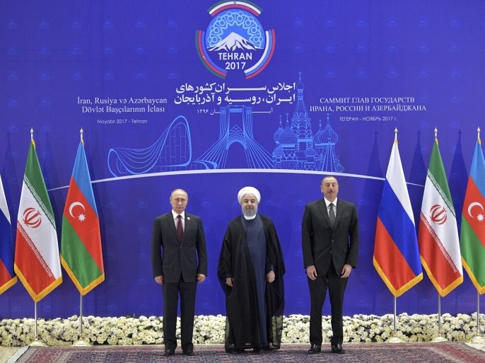 (L-R) Russia's President Vladimir Putin, Iran's President Hassan Rouhani and Azerbaijan's President Ilham Aliyev pose for a picture during a meeting in Tehran, Iran November 1, 2017. Sputnik/Alexei Druzhinin/Kremlin via REUTERS ATTENTION EDITORS - THIS IMAGE WAS PROVIDED BY A THIRD PARTY.