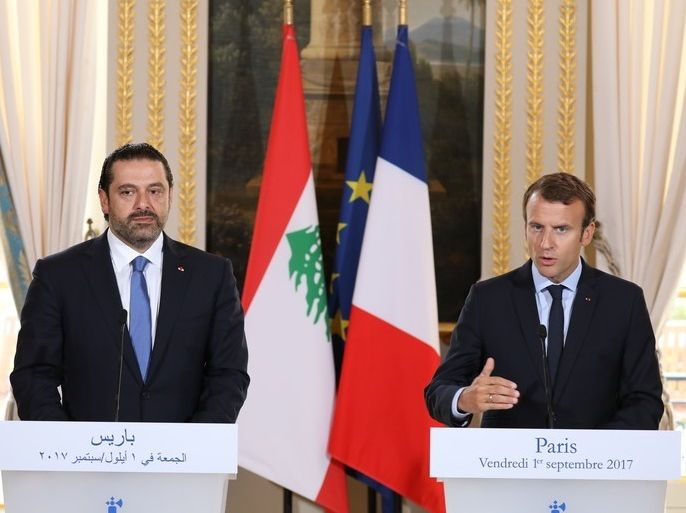 epa06176733 French President Emmanuel Macron (R) and Lebanese Prime Minister Saad Hariri (L) give a press conference at the Elysee Palace in Paris, France, 01 September 2017. Saad Hariri will also meet French Prime Minister Edouard Philippe and Foreign Minister Jean-Yves Le Drian during his official visit to France. EPA-EFE/LUDOVIC MARIN / POOL MAXPPP OUT