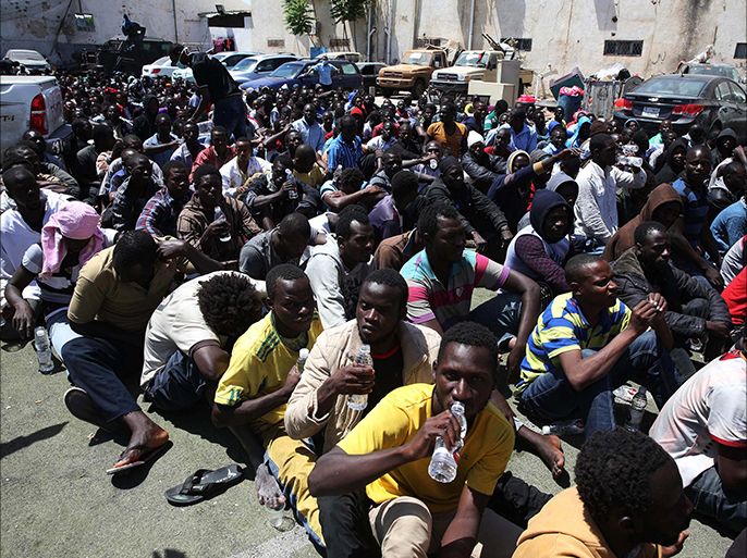 epa04763456 Libyan authortities detain 600 people they suspect were trying to cross illegally to Europe, now being held in Tripoli, Libya, 23 May 2015. The EU approved 18 May plans for the creation of a new naval mission to stem the flow of people trying to cross the Mediterranean, which according to UNHCR have numbered almost 40''000 successfully arriving to Greece, Italy and Malta alone in 2015 while an estimated 2000 have died en route. EPA/STR