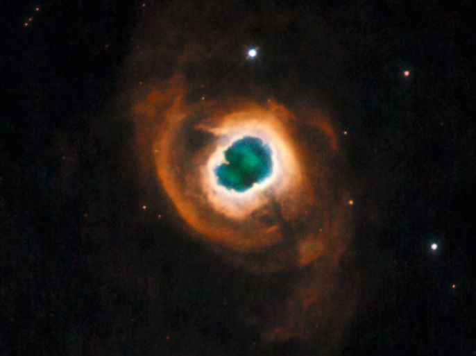 The Hubble Space telescope's soon-to-be decommissioned Wide Field Planetary Camera 2 photographed this image of planetary nebula K 4-55 as its final image, released by NASA May 10, 2009. This Hubble image was taken by WFPC2 on May 4, 2009. The colors represent the makeup of the various emission clouds in the nebula: red represents nitrogen, green represents hydrogen, and blue represents oxygen. K 4-55 is nearly 4,600 light-years away in the constellation Cygnus. REUTERS/NASA, ESA, and the Hubble Heritage Team (STScI/AURA)/Handout (UNITED STATESD SCI TECH) FOR EDITORIAL USE ONLY. NOT FOR SALE FOR MARKETING OR ADVERTISING CAMPAIGNS