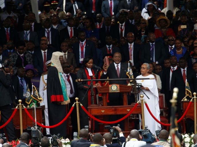Kenya's President Uhuru Kenyatta takes oath of office during inauguration ceremony at Kasarani Stadium in Nairobi, Kenya November 28, 2017. REUTERS/Thomas Mukoya