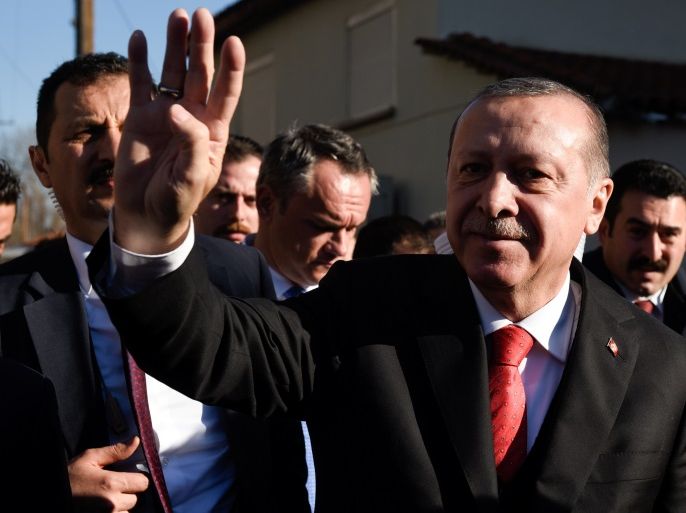 Turkish President Tayyip Erdogan waves as he exits a mosque folowing Friday prayers in the city of Komotini, Greece, December 8, 2017. REUTERS/Alexandros Avramidis