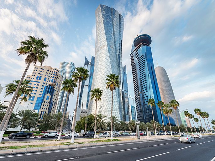 Famous Corniche, the waterfront street along Doha Bay, with its futuristic skyscrapers.