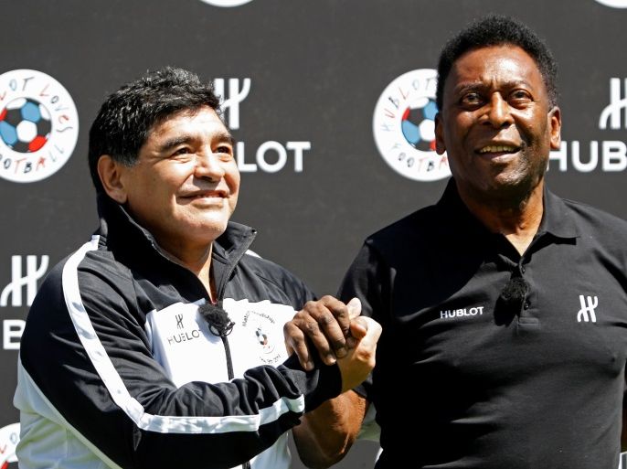 Football legends Pele (R) and Diego Maradona attend an advertising soccer event on the eve of the opening of the UEFA 2016 European Championship in Paris, France, June 9, 2016. REUTERS/Charles Platiau TPX IMAGES OF THE DAY