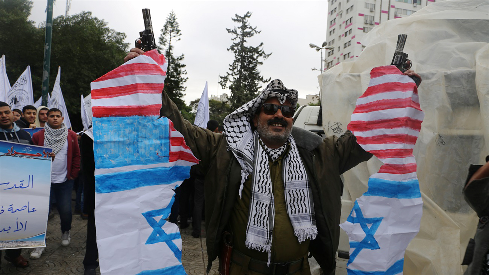 أبو بكر النحال في مسيرة الفصائل بغزة قبل ساعات من إعلان ترمب موقف إدارته بشأن اعتبار القدس عاصمة لإسرائيل(الجزيرة)