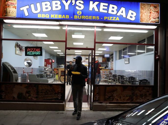 Grime group Slew Dem Crew leave Tubby's Kebab, after a radio show, in Hackney Wick, London, September 11, 2016. REUTERS/Paul Hackett SEARCH