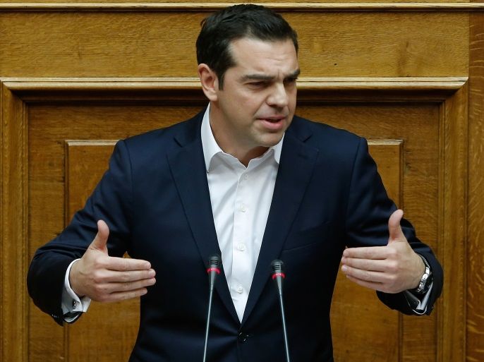 Greek Prime Minister Alexis Tsipras addresses lawmakers during a parliamentary session before a budget vote in Athens, Greece December 19, 2017. REUTERS/Costas Baltas