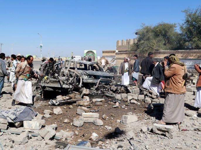 People inspect damage at the site of air strikes in the northwestern city of Saada, Yemen December 20, 2017. REUTERS/Naif Rahma