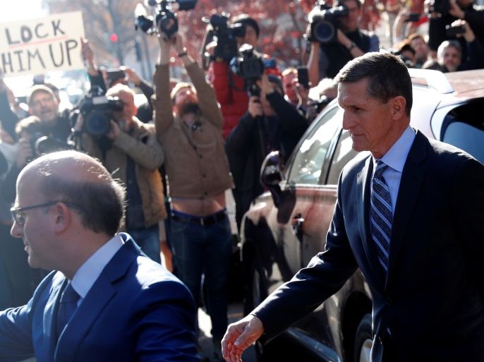 Former U.S. National Security Adviser Michael Flynn departs U.S. District Court, where he was expected to plead guilty to lying to the FBI about his contacts with Russia's ambassador to the United States, in Washington, U.S., December 1, 2017. REUTERS/Jonathan Ernst TPX IMAGES OF THE DAY