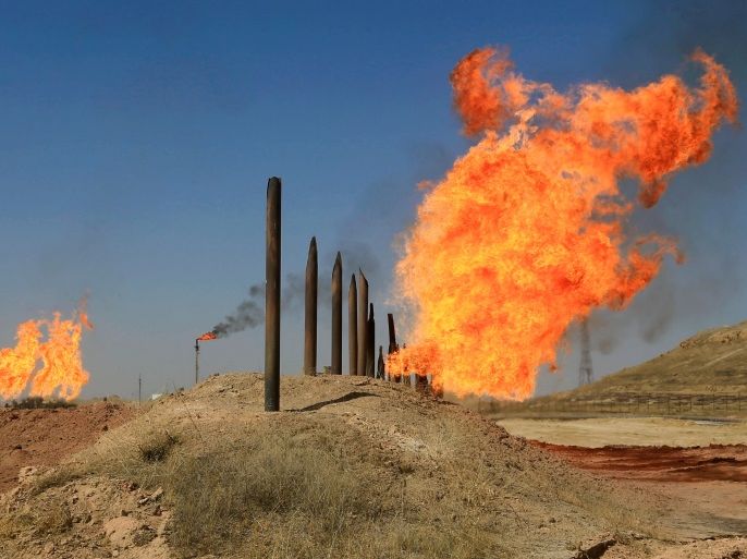 Flames emerge from flare stacks at the oil fields in Kirkuk, Iraq October 18, 2017. REUTERS/Alaa Al-Marjani
