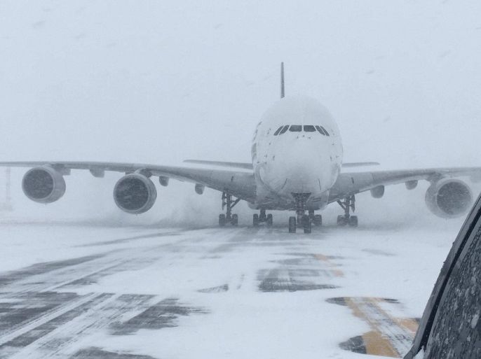 A Singapore Airlines Airbus A380, diverted from John F. Kennedy Airport during a winter storm, is shown on the runway after landing at Stewart International Airport in Newburgh, New York, U.S., January 4, 2018. Courtesy of Stewart Airport/Handout via REUTERS ATTENTION EDITORS - THIS IMAGE WAS PROVIDED BY A THIRD PARTY