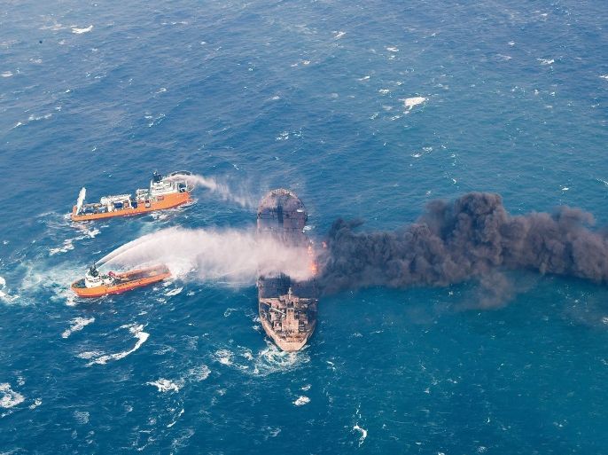 Rescue ships work to extinguish the fire on the Panama-registered Sanchi tanker carrying Iranian oil, which went ablaze after a collision with a Chinese freight ship in the East China Sea, in this January 10, 2018 picture provided by China's Ministry of Transport and released by China Daily. China Daily via REUTERS ATTENTION EDITORS - THIS IMAGE WAS PROVIDED BY A THIRD PARTY. CHINA OUT.