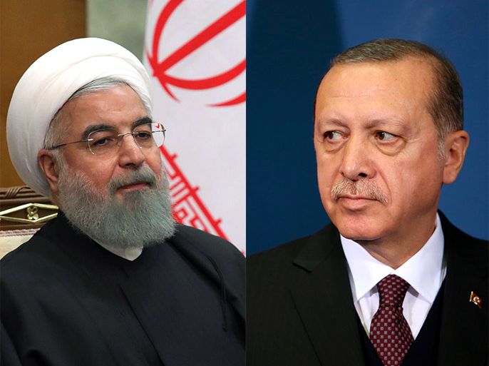 من اليمين الرئيس التركي رجب طيب أردوغان والرئيس الإيراني حسن روحاني