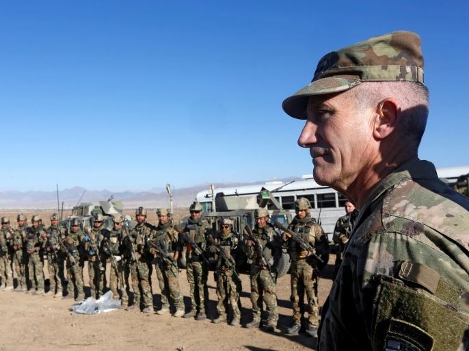 U.S. Army General John Nicholson, commander of Resolute Support forces and U.S. forces in Afghanistan, speaks with Afghan police special forces after they took part in a military exercise in Logar province, Afghanistan November 30, 2017. REUTERS/Omar Sobhani