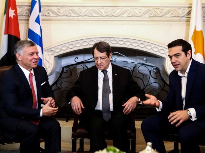 Cypriot President Nicos Anastasiades (C), Greek Prime Minister Alexis Tsipras (R) and Jordan's King Abdullah talk during a meeting at the Presidential Palace in Nicosia, Cyprus January 16, 2018. REUTERS/Iakovos Hatzistavrou/Pool