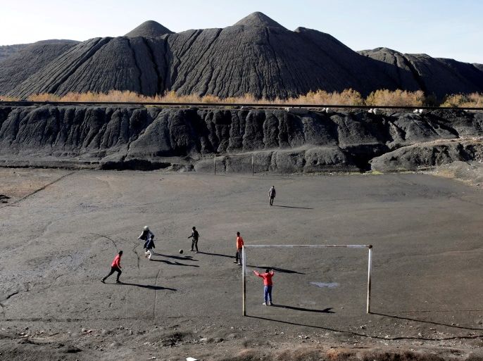 Children play football at what used to be a coal mine in Jerada, Morocco, January 20, 2018. Picture taken January 20, 2018. REUTERS/Youssef Boudlal TPX IMAGES OF THE DAY