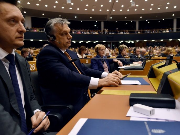 Hungary's Prime Minister Viktor Orban (2nd R) looks on during a plenary session at the European Parliament (EP) in Brussels, Belgium April 26, 2017. REUTERS/Eric Vidal