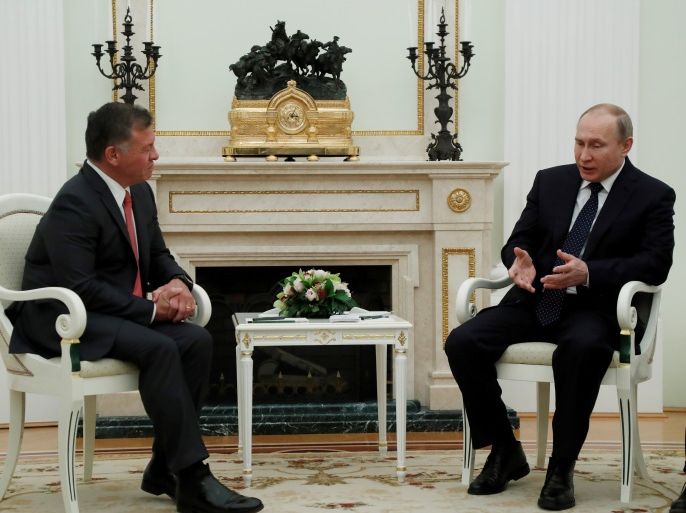Russian President Vladimir Putin speaks with King Abdullah of Jordan during their meeting at the Kremlin in Moscow, Russia February 15, 2018. REUTERS/Sergei Chirikov/Pool
