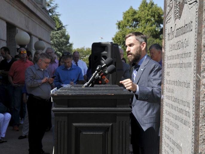 Oklahoma ACLU executive director Ryan Kiesel speaks to demonstrators protesting the scheduled execution of convicted murderer Richard Glossip, at the state capitol in Oklahoma City, Oklahoma September 15, 2015. Glossip, 52, is set to be put to death by lethal injection at the state's death chamber in McAlester on Wednesday at 3 p.m. local time after unsuccessfully challenging the legality of Oklahoma's lethal injection mix. He was found guilty of arranging the 1997 murder of the owner of an Oklahoma City motel he was managing. REUTERS/Nick Oxford