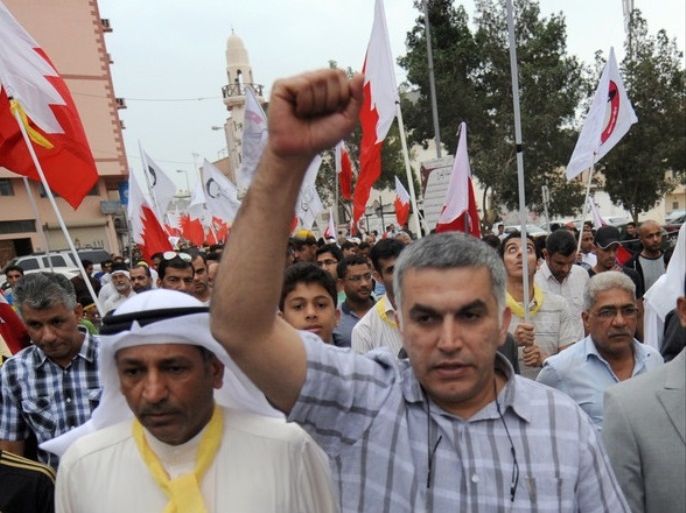 epa06549195 (FILE) - Bahrain activist Nabeel Rajab (R) takes part in a march in Bilad Al-Qadeem village, a suburb of the Bahraini capital Manama, 01 April 2012 (reissued 21 February 2018). Reports on 21 February 2018 state activist Nabeel Rajab was sentenced to five years in prison over tweets criticizing the government. EPA-EFE/MAZEN MAHDI