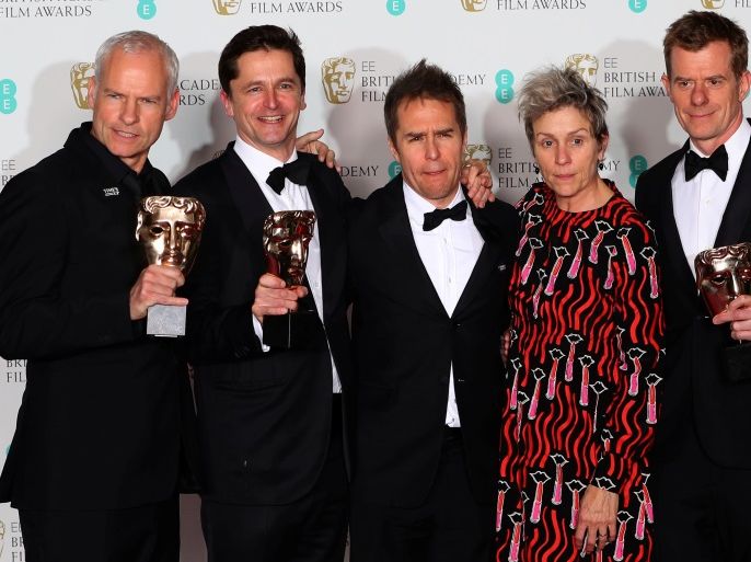 Martin McDonagh, Peter Czernin, Sam Rockwell and Graham Broadbent, pose with Frances McDormand, as they hold their trophies for Best Film for 'Three Billboards Outside Ebbing Missouri' at the British Academy of Film and Television Awards (BAFTA) at the Royal Albert Hall in London, Britain February 18, 2018. REUTERS/Hannah McKay