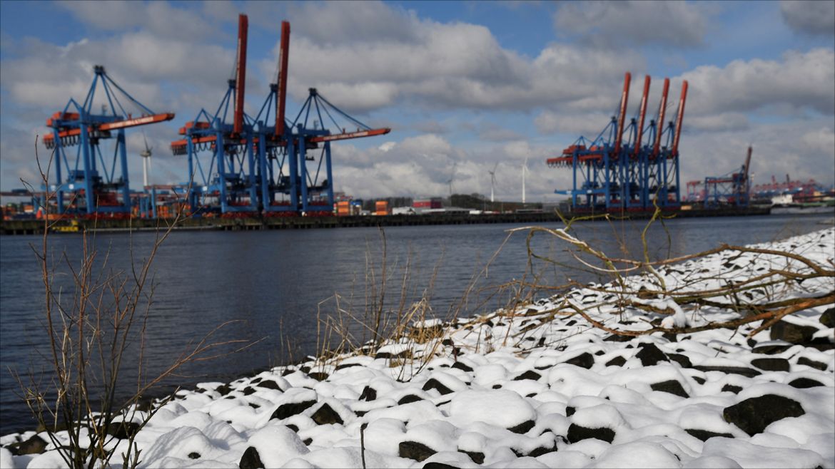 Snow is seen in front of container terminals in the port of Hamburg, Germany, February 27, 2018. REUTERS/Fabian Bimmer